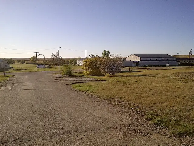 Former military base buildings on the prairie
